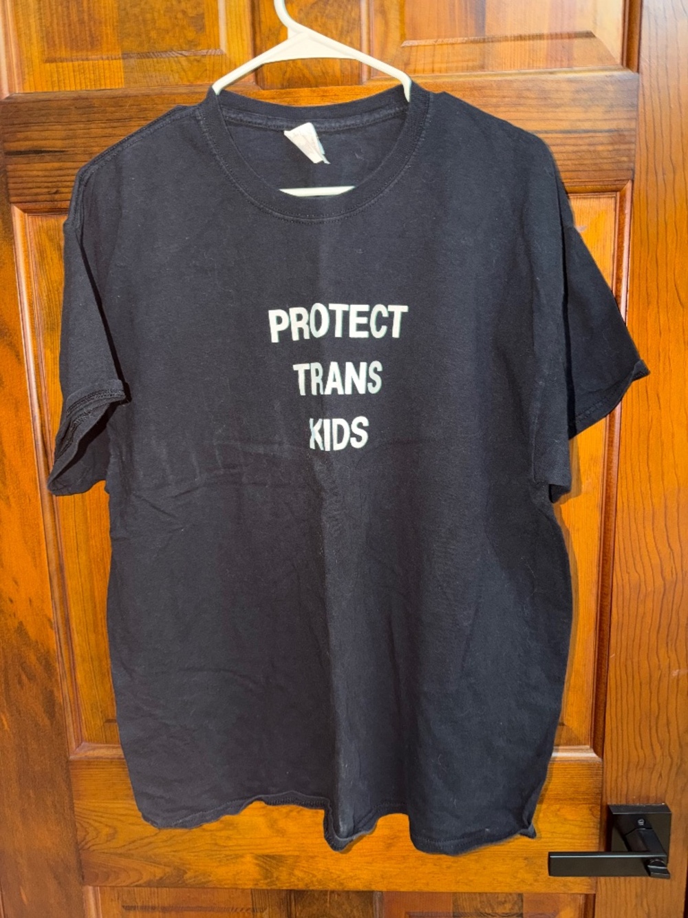 Seven shirts supporting Trans People (5 trans youth, two more generically trans